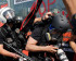 A Turkish riot policeman pushes a photographer during a protest at Taksim Square in Istanbul, June 11, 2013.